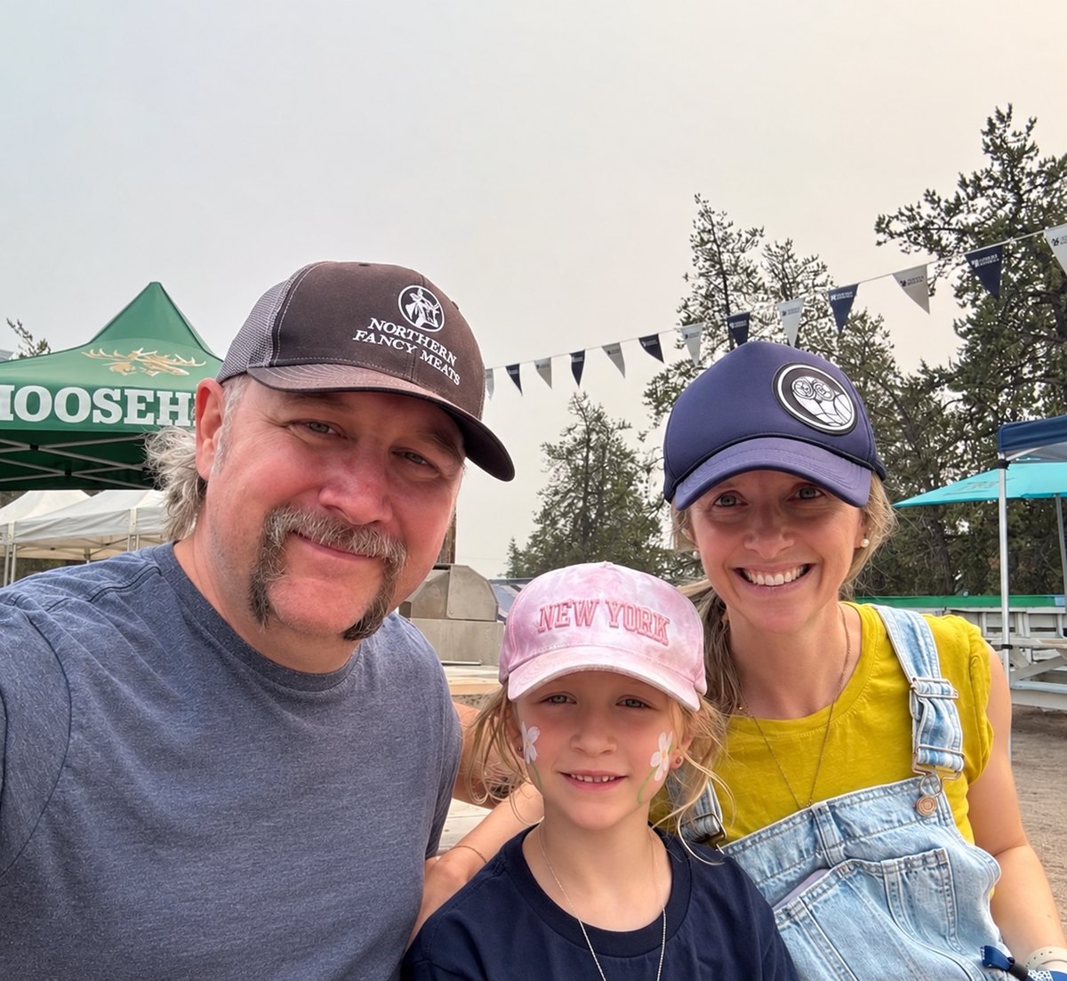 Melissa Syer with her husband and daughter
